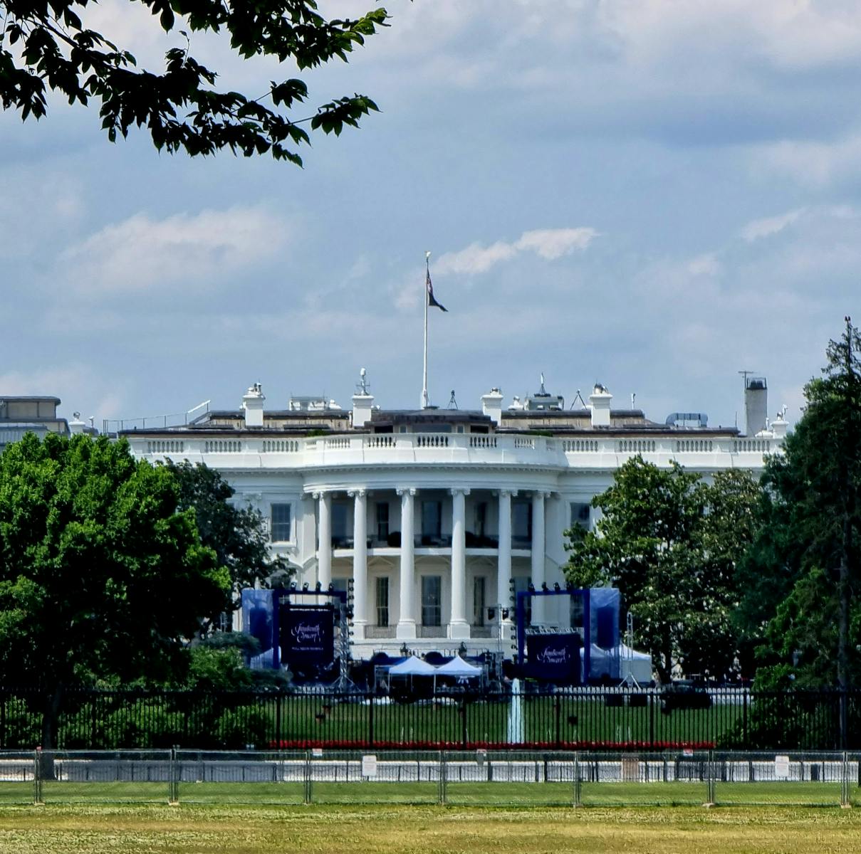 Front view of the White House in Washington, DC, showcasing its iconic architecture.