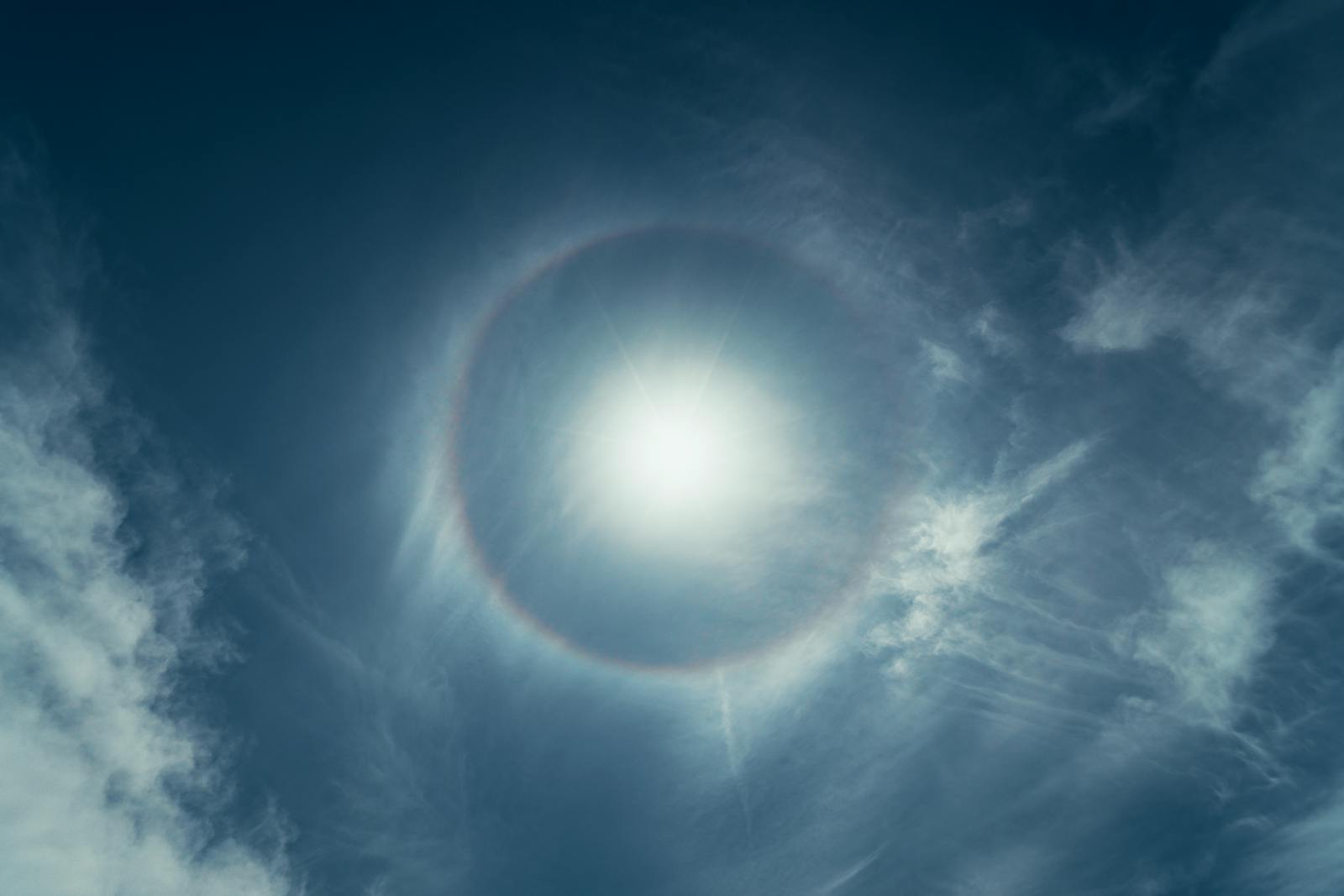 Spectacular solar halo captured in a bright blue sky over Las Vegas, Nevada.