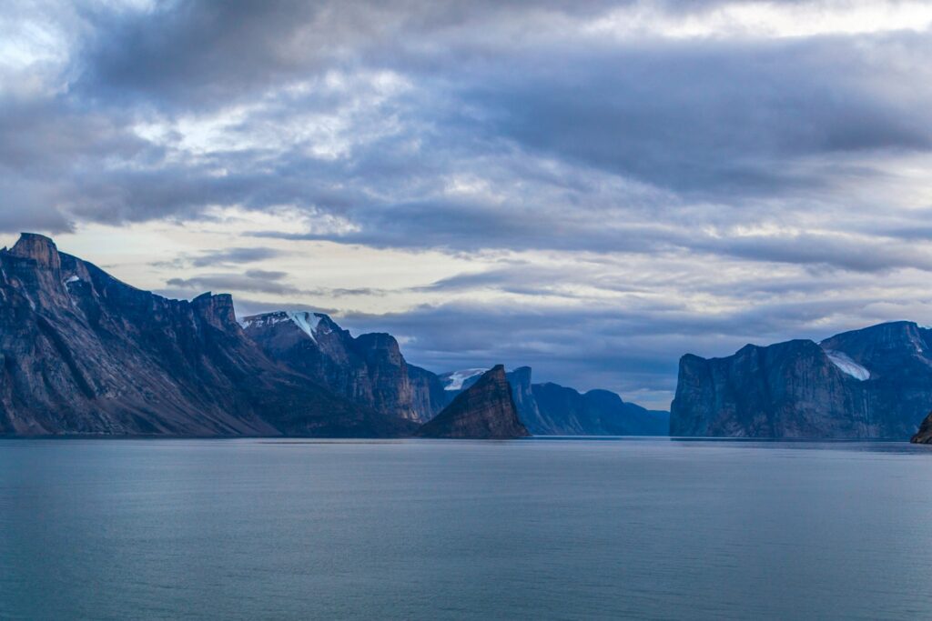 a large body of water surrounded by mountains