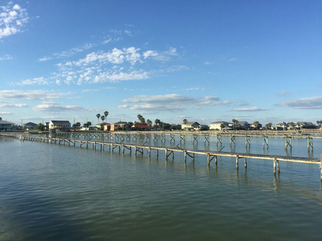 a large body of water next to a city