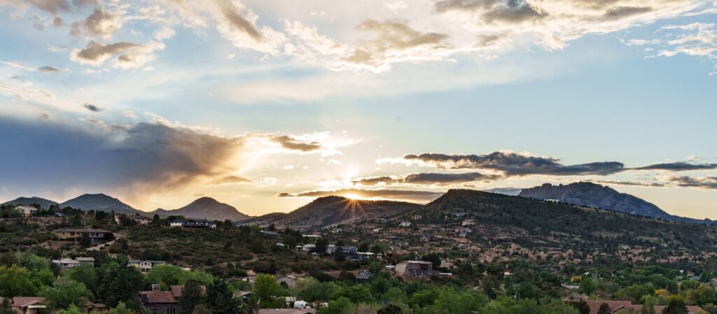A view of a city with mountains in the background