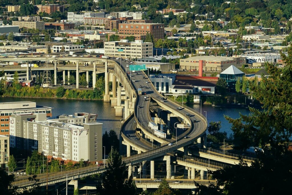 A view of a city and a bridge over a river