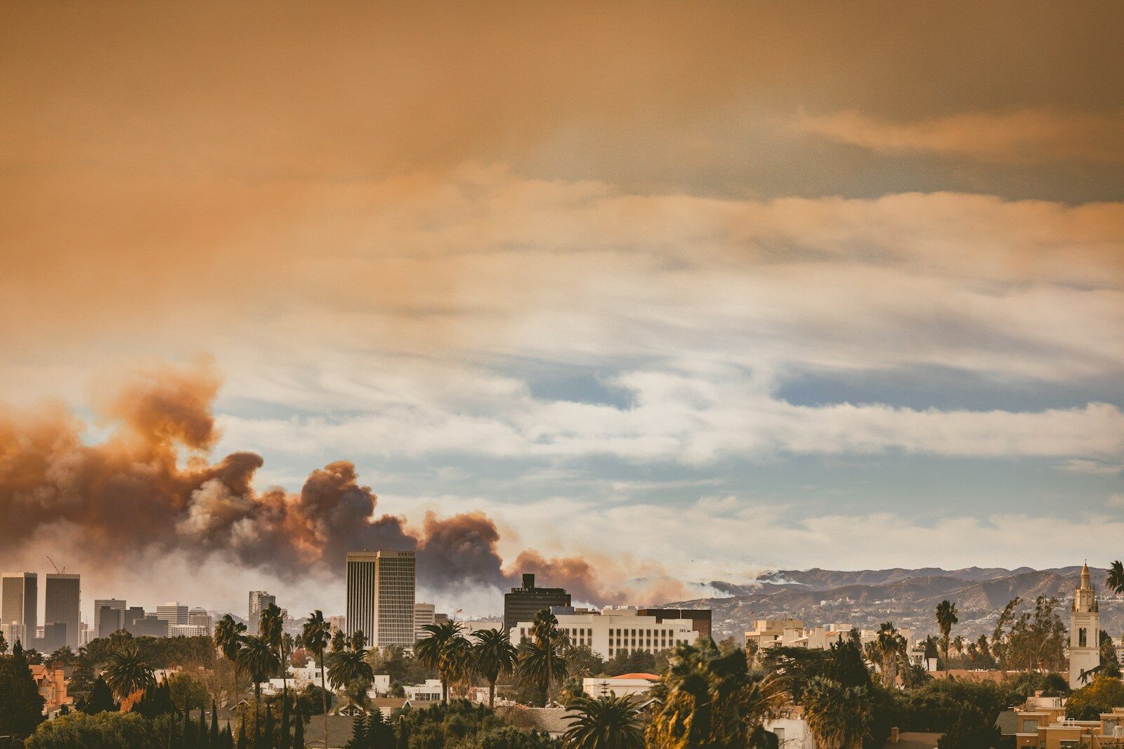A city with a lot of smoke coming out of it