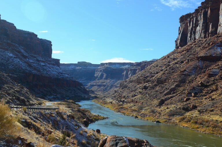 A river running through a canyon surrounded by mountains