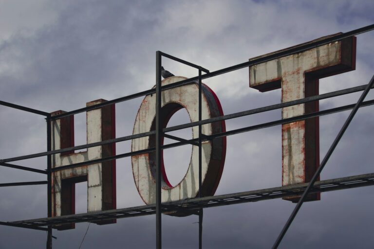 Large weathered letters spell out hot