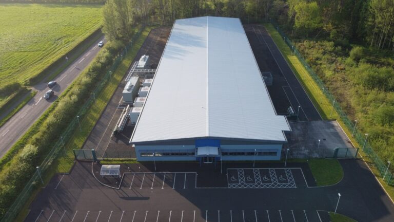an aerial view of a large warehouse building