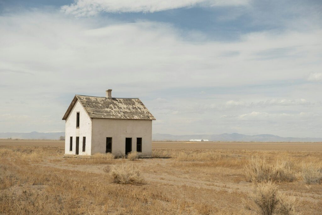 an old abandoned house in the middle of nowhere