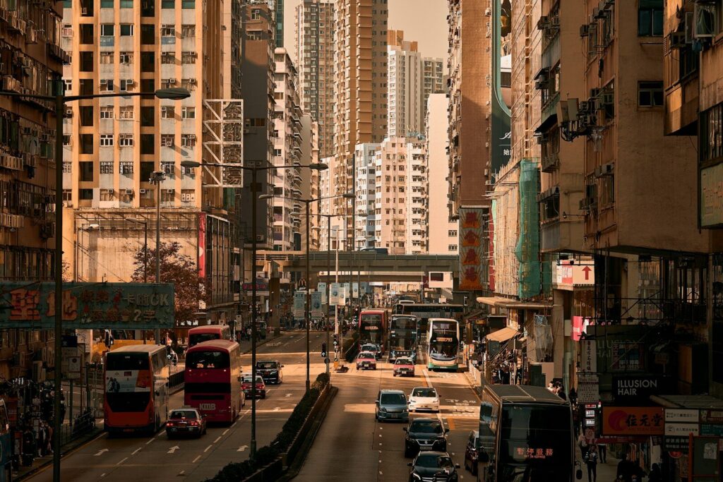 a city street filled with lots of tall buildings