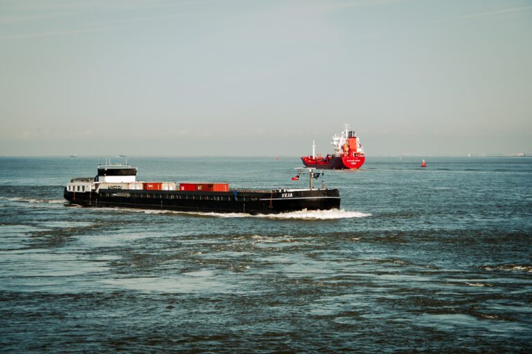 Cargo Ships Sail Across The Top Of The world